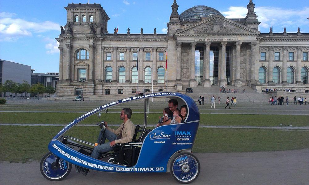 Cruising past the iconic Bundestag in a BikeTaxi 